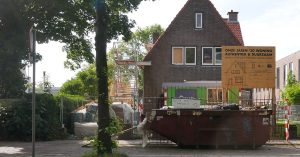 Duurzaam bouwbord en bouwteam