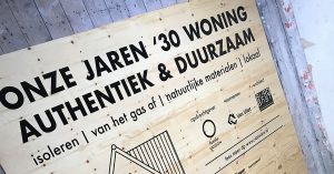 Duurzaam bouwbord en bouwteam